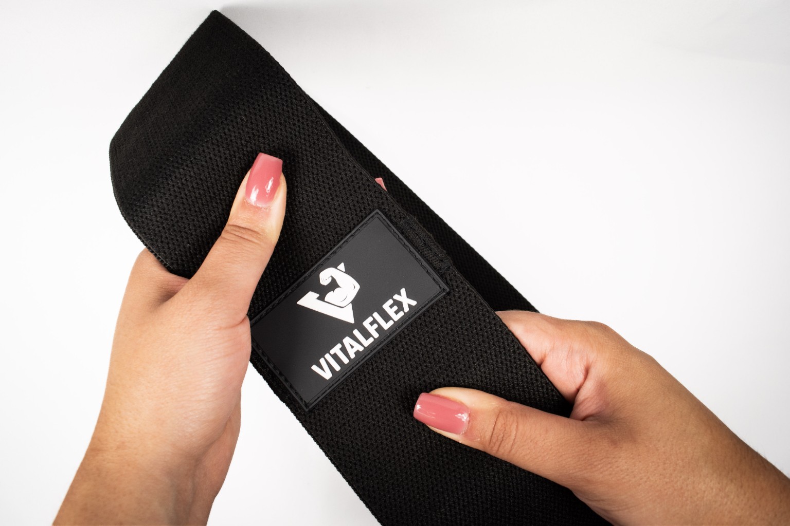 Close-up detail of VITALFLEX resistance band flexibility